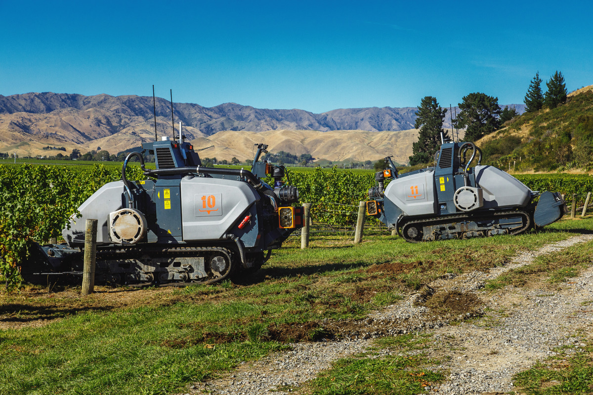 Two Oxin autonomous vineyard robot tractors at work in the vineyards of Marborough