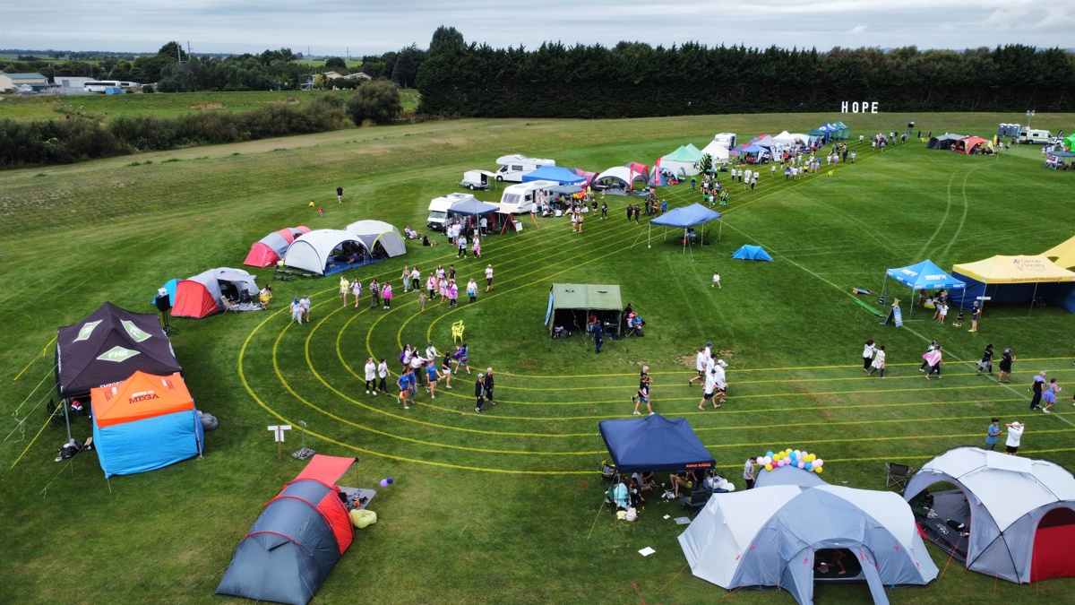 An aerial view of tents on a sports field at the Relay For Life event